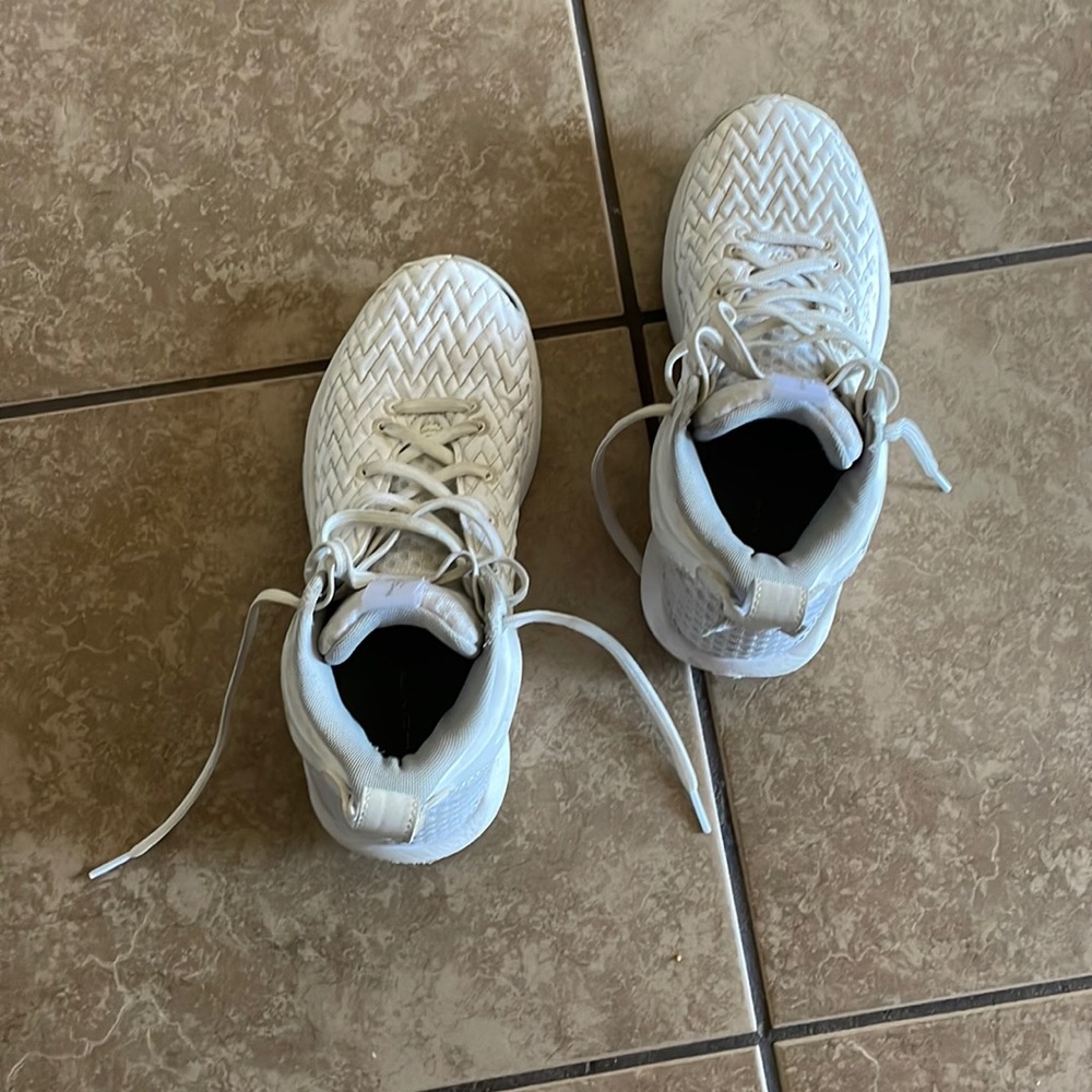 White basketball shoes, worn for one season in good condition. Size-8